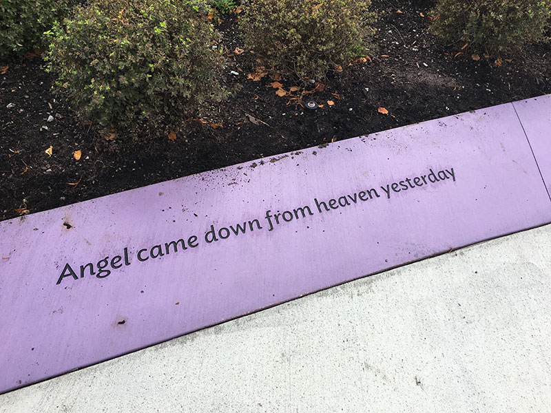 Memorial that reads 'angel came down from heaven yesterday' at Jimi Hendrix Park in Seattle.